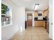 Open concept kitchen with bright natural light and stainless steel appliances at 1151 Xanthia St, Denver, CO 80220