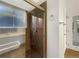 Modern bathroom featuring a glass-enclosed shower and updated fixtures at 12375 Ivy Pl, Brighton, CO 80602