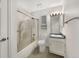 Standard bathroom featuring shower and bathtub combo with bright, neutral color scheme at 12375 Ivy Pl, Brighton, CO 80602