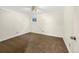 Neutral bedroom showcasing carpeted floors, white walls, and a window at 12375 Ivy Pl, Brighton, CO 80602