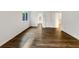 Spacious bedroom featuring laminate flooring and a neutral color palette at 12375 Ivy Pl, Brighton, CO 80602