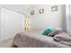 Cozy bedroom with built-in closet and soft lighting at 20697 E Lake Ave, Centennial, CO 80016