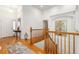 Bright entryway with hardwood floors and staircase at 20697 E Lake Ave, Centennial, CO 80016