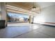 Spacious two-car garage with epoxy flooring and open view at 20697 E Lake Ave, Centennial, CO 80016