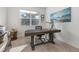 Home office with desk and window overlooking backyard at 20697 E Lake Ave, Centennial, CO 80016