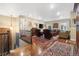 Spacious landing with classic decor, hardwood floors, and comfortable seating areas at 1995 Wingfeather Ln, Castle Rock, CO 80108