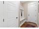 Practical mudroom with built-in storage cubbies, bench, and convenient access to the home at 1995 Wingfeather Ln, Castle Rock, CO 80108