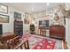 Charming home office featuring rustic decor, hardwood floors, and ample natural light at 1995 Wingfeather Ln, Castle Rock, CO 80108