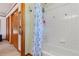 Bathroom with shower/tub combo and updated fixtures at 2311 W 46Th Ave, Denver, CO 80211