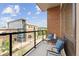Balcony with stylish seating area offers views of the town at 20 Wilcox St # 318, Castle Rock, CO 80104
