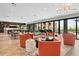 Bright clubhouse offers cozy seating, modern lighting, and access to outdoor patio at 20 Wilcox St # 318, Castle Rock, CO 80104