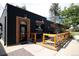 Trendy coffee shop with outdoor patio and modern black exterior at 20 Wilcox St # 318, Castle Rock, CO 80104