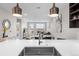 Bright living area with contemporary decor, open to dining, with natural light and a balcony at 20 Wilcox St # 318, Castle Rock, CO 80104