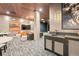 Cozy lounge offers seating, a wet bar, and media, for relaxation and entertainment at 20 Wilcox St # 318, Castle Rock, CO 80104