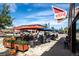 Cafe with outdoor seating under colorful umbrellas, creating a vibrant and inviting atmosphere for patrons at 20 Wilcox St # 318, Castle Rock, CO 80104