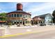 Charming street view featuring a round building topped with a water tower and several quaint shops at 20 Wilcox St # 318, Castle Rock, CO 80104