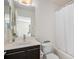 Clean, well-lit bathroom features a vanity with modern fixtures and a shower-tub combination at 3389 Cranston Cir, Highlands Ranch, CO 80126