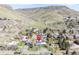 An aerial view showing the proximity to open space and mountains in the background at 3995 Easley Rd, Golden, CO 80403