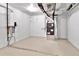 Basement mechanical room with HVAC equipment including a Goodman furnace and a water heater at 6716 W Rowland Ave, Littleton, CO 80128