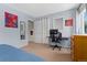 Bedroom featuring carpet, a desk, and neutral walls, creating a versatile and comfortable space at 980 S Nile Way, Aurora, CO 80012