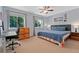 Inviting bedroom boasting large windows, neutral carpet, and comfortable bedding at 980 S Nile Way, Aurora, CO 80012