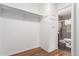Closet with shelving and storage, adjacent to a renovated bathroom at 200 N Sherman St # 7, Denver, CO 80203