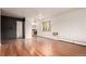 Open floorplan featuring hardwood floors and access to the kitchen at 200 N Sherman St # 7, Denver, CO 80203