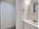 Bathroom featuring a shower and vanity, providing essential amenities in a compact space at 17681 E Loyola Dr # E, Aurora, CO 80013