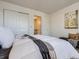 Serene bedroom featuring closet and ample space, perfect for relaxing and unwinding after a long day at 17681 E Loyola Dr # E, Aurora, CO 80013