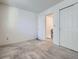 Spacious bedroom with a closet and a window, ready for your personal touches at 17681 E Loyola Dr # E, Aurora, CO 80013
