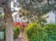 Charming view of the wooden deck surrounded by lush greenery at 17681 E Loyola Dr # E, Aurora, CO 80013