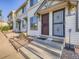 Beautiful townhome exterior with a well-manicured lawn and welcoming entrance at 17681 E Loyola Dr # E, Aurora, CO 80013