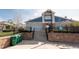 Community clubhouse entrance with landscaping, providing a welcoming space for residents at 5732 S Addison Way # E, Aurora, CO 80016