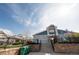 Community clubhouse featuring blue siding, stone accents, well-maintained landscaping, and accessible entrance at 5732 S Addison Way # E, Aurora, CO 80016