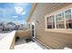Private patio with neutral siding, perfect for outdoor relaxation and entertaining overlooking well-maintained landscaping at 5732 S Addison Way # E, Aurora, CO 80016