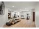 Basement gym equipped with fitness equipment, mirrors, and ample space for a complete workout routine at 96 Glenmoor Ln, Cherry Hills Village, CO 80113
