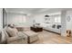 Spacious living room with comfortable seating, large screen, and a cozy atmosphere for relaxation and entertainment at 96 Glenmoor Ln, Cherry Hills Village, CO 80113