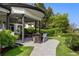 Inviting patio with a cozy fire pit and comfortable seating, perfect for outdoor relaxation at 96 Glenmoor Ln, Cherry Hills Village, CO 80113