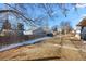 Backyard with grassy area and wooden fence at 10690 E 8Th Ave, Aurora, CO 80010