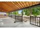 Covered front porch with concrete flooring and a view of the front yard at 1758 S Tucson St, Aurora, CO 80012