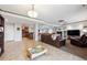Spacious basement area with ample space, tile floors, and an open floor plan at 5810 Moss Ct, Golden, CO 80403