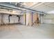 Spacious unfinished basement with exposed utilities, perfect for customization or storage at 9283 Sedalia St, Commerce City, CO 80022