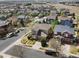 Overhead view showcases a charming neighborhood with well-maintained homes, mature trees, and inviting curb appeal at 10273 Salida St, Commerce City, CO 80022
