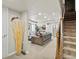 Inviting basement area features a comfortable seating area and a staircase at 10273 Salida St, Commerce City, CO 80022