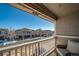 View from balcony overlooking townhomes and parking lot at 17358 Waterhouse Cir # F, Parker, CO 80134