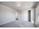 Bedroom with sliding door closet and carpet at 17358 Waterhouse Cir # F, Parker, CO 80134