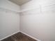 Walk-in closet with wire shelving and hanging rods at 17358 Waterhouse Cir # F, Parker, CO 80134