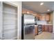 Walk-in pantry with ample shelving for storage at 17358 Waterhouse Cir # F, Parker, CO 80134