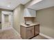 Basement bar area complete with sink, countertop, and beverage cooler at 613 Iowa St, Golden, CO 80403