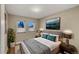 Comfortable bedroom with views, bedside lamps, and stylish decor at 613 Iowa St, Golden, CO 80403